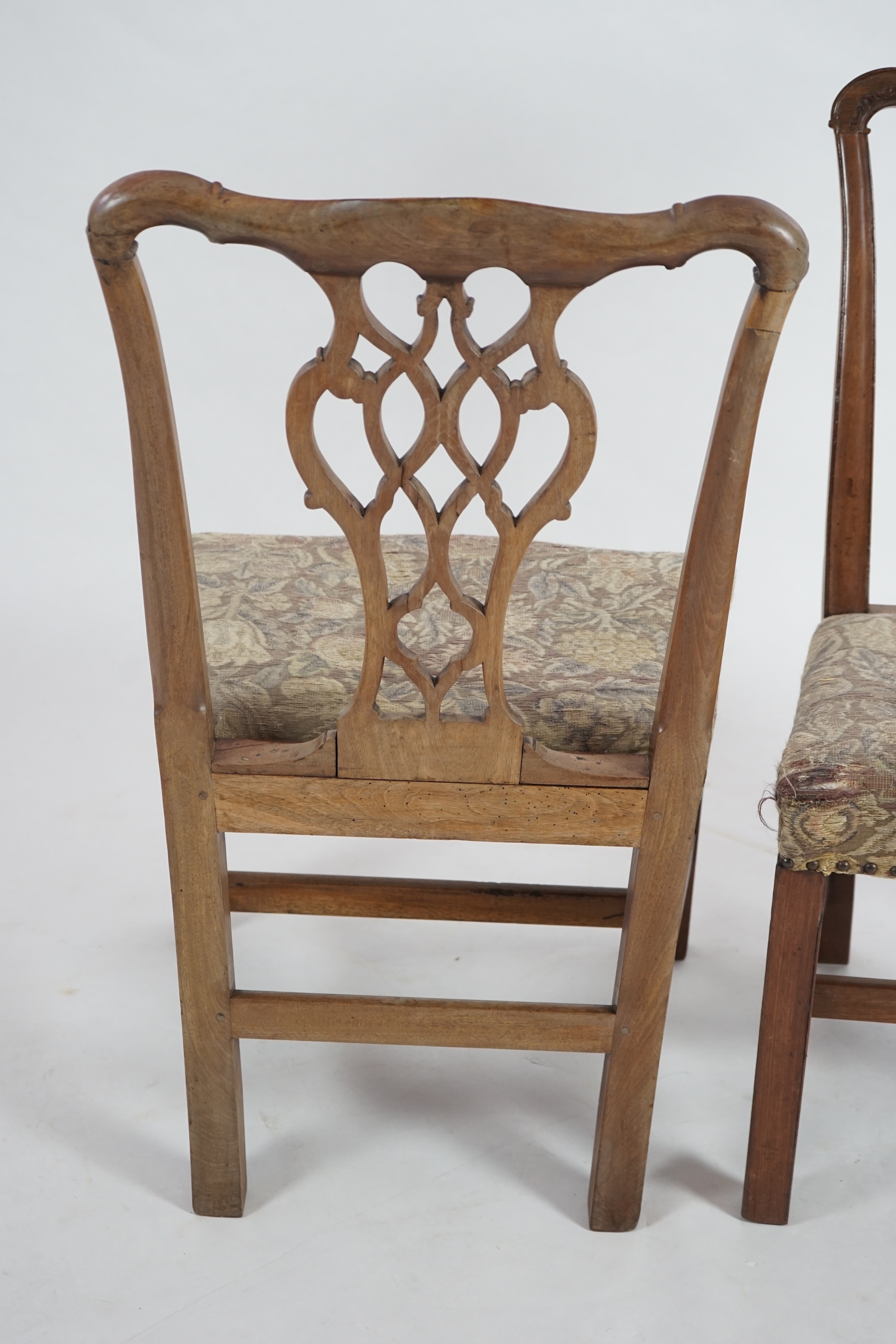 A pair of George III Chippendale style mahogany dining chairs